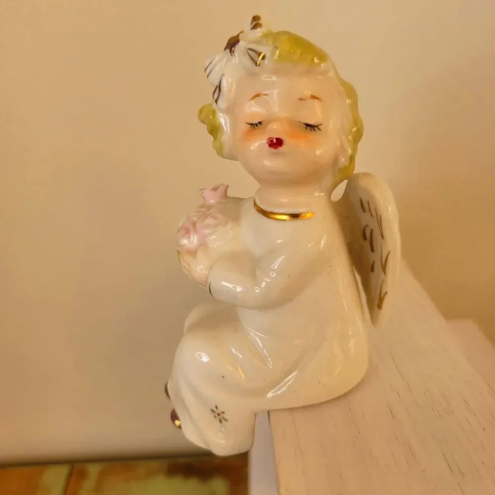 Ceramic Angel Figurine with Flowers